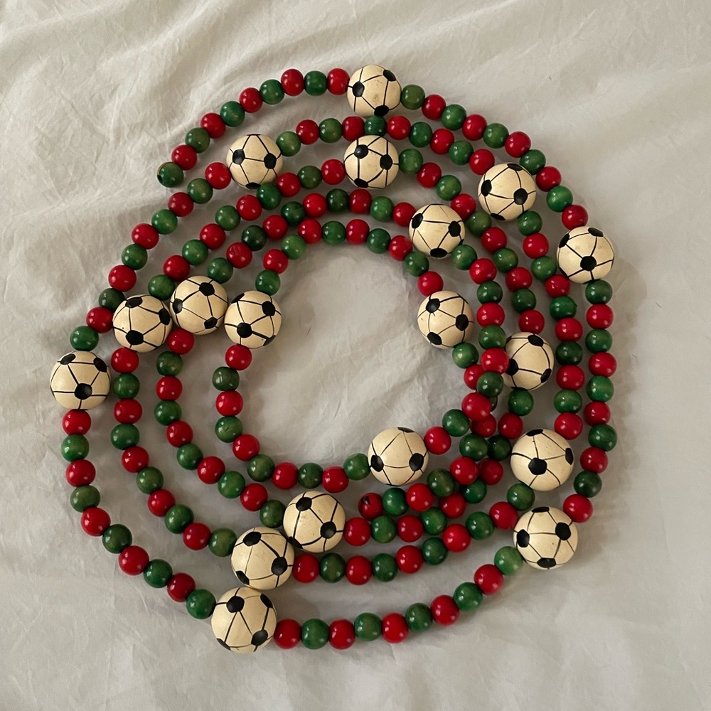 World Cup Time.Christmas wooden bead soccer ball garland. 8’ strands. 6 strands.